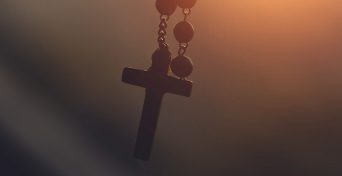 silhouette-photography-of-hanging-rosary-2081128